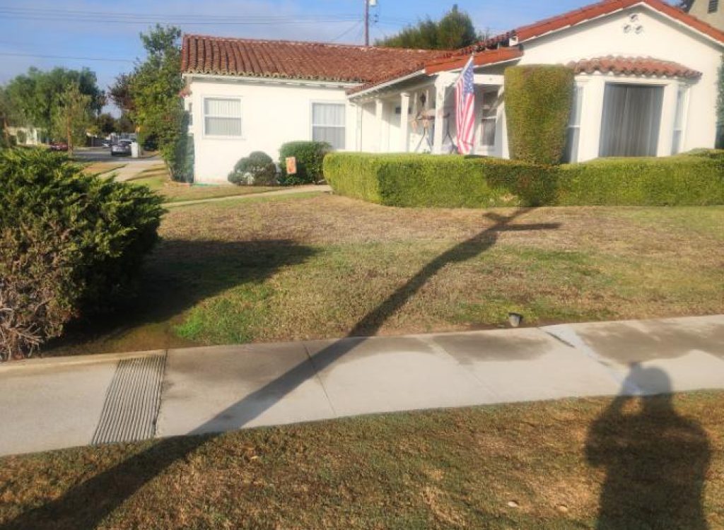 Dry summer lawn and irrigation system in South El Monte